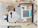Aerial view showcases the home's layout, pool, solar panels, desert landscape and privacy-fenced backyard at 3424 Mount Charleston Dr, Pahrump, NV 89048