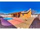 This backyard features a pool and a covered patio, perfect for entertaining at 3424 Mount Charleston Dr, Pahrump, NV 89048