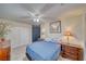Serene bedroom featuring carpet flooring, wooden furniture, and large windows providing natural light at 3424 Mount Charleston Dr, Pahrump, NV 89048