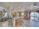 Spacious kitchen boasts a granite island with seating and stainless steel appliances at 3424 Mount Charleston Dr, Pahrump, NV 89048