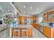 This kitchen features stainless appliances, granite countertops, and seamlessly connects to the living area at 3424 Mount Charleston Dr, Pahrump, NV 89048