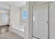 Bathroom featuring separate shower and soaking tub with tiled floor at 367 Wilford Springs St, Henderson, NV 89014