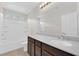 Bright bathroom featuring a single sink vanity and a shower-tub combination at 367 Wilford Springs St, Henderson, NV 89014