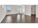 Large main bedroom with hardwood floors, lots of natural light, and an en-suite bathroom at 367 Wilford Springs St, Henderson, NV 89014