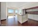 Modern living space with island kitchen, stainless appliances, and floor to ceiling windows at 3750 Las Vegas Blvd # 3301, Las Vegas, NV 89158