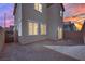 Spacious backyard featuring desert landscaping, a block wall, and the rear of the home at 393 Desert Cadence St, Henderson, NV 89011