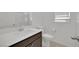 Modern bathroom with vanity, sink, toilet, and shower at 393 Desert Cadence St, Henderson, NV 89011