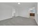 Spacious bedroom with neutral carpet and ensuite bathroom at 393 Desert Cadence St, Henderson, NV 89011