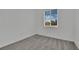 Simple bedroom with carpet and window, providing plenty of natural light at 393 Desert Cadence St, Henderson, NV 89011