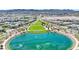 Scenic aerial view of the community lake, showcasing lush landscaping and recreational amenities for residents at 393 Desert Cadence St, Henderson, NV 89011
