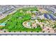 Aerial view of the community park, featuring walking trails, playgrounds, and open green spaces for outdoor activities at 393 Desert Cadence St, Henderson, NV 89011