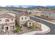 Inviting two-story home featuring a brick driveway and desert landscaping in a Gathering-friendly neighborhood at 393 Desert Cadence St, Henderson, NV 89011
