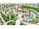Overhead view of the community playground, featuring climbing structures, slides, and shaded areas for children to enjoy at 393 Desert Cadence St, Henderson, NV 89011