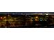 Scenic city view with bright lights and palm trees at 3980 Heron Fairway Dr, Las Vegas, NV 89141