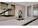 Modern kitchen featuring stainless steel appliances, a spacious island and bar seating at 3980 Heron Fairway Dr, Las Vegas, NV 89141
