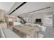 Open-concept living and dining area featuring modern design elements and abundant natural light at 3980 Heron Fairway Dr, Las Vegas, NV 89141