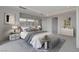Comfortable main bedroom with modern decor, soft lighting and a cozy ambiance at 3980 Heron Fairway Dr, Las Vegas, NV 89141