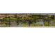 Scenic view of houses, trees and water from a balcony with a metal railing at 3980 Heron Fairway Dr, Las Vegas, NV 89141