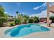 An inviting backyard pool with desert landscaping at 4129 Fabulous Finches Ave, North Las Vegas, NV 89084