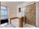 Bathroom features a soaking tub and a granite shower near the bedroom at 4129 Fabulous Finches Ave, North Las Vegas, NV 89084