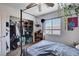 Bright bedroom with a ceiling fan and closet at 4129 Fabulous Finches Ave, North Las Vegas, NV 89084