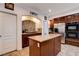 Kitchen with island and stainless steel appliances at 4129 Fabulous Finches Ave, North Las Vegas, NV 89084
