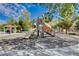 Community playground with slides and covered picnic area for outdoor fun at 4129 Fabulous Finches Ave, North Las Vegas, NV 89084