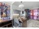 Efficient condo kitchenette with stainless steel appliances, breakfast bar, and stylish modern finishes at 4381 W Flamingo Rd # 1907, Las Vegas, NV 89103