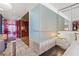 Unique living space with modern tile flooring, a small dining area, and closet space at 4381 W Flamingo Rd # 1907, Las Vegas, NV 89103
