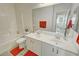 Bathroom featuring double sinks, a tub with shower, and tile flooring at 4780 Lorenzo Way, Pahrump, NV 89061