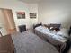 Bedroom featuring carpet, a dark wood bed, and an adjacent closet at 4780 Lorenzo Way, Pahrump, NV 89061