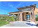 Attractive grill room entrance with stone accents and golf course views at 4780 Lorenzo Way, Pahrump, NV 89061
