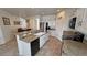 Updated kitchen featuring granite counters, white cabinets, and stainless steel appliances at 4780 Lorenzo Way, Pahrump, NV 89061