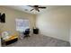 Versatile room featuring neutral walls, carpeted flooring, with a window and door visible at 4780 Lorenzo Way, Pahrump, NV 89061