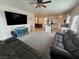 Spacious living area offers an open layout to the kitchen and dining area at 4780 Lorenzo Way, Pahrump, NV 89061