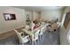 Elegantly furnished living room features ornate chairs, a table, and a view of the dining area at 4780 Lorenzo Way, Pahrump, NV 89061