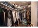 Organized walk-in closet with shelves, hanging clothes, and ample storage space at 5014 Sail Rock Pl, North Las Vegas, NV 89031