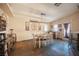 Dining room with rustic decor, farmhouse dining table, and decorative lighting at 5014 Sail Rock Pl, North Las Vegas, NV 89031