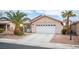 Inviting single-story home featuring desert landscaping and a two-car garage at 5014 Sail Rock Pl, North Las Vegas, NV 89031