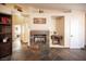 Stylish living room highlighting a fireplace, built-in shelves, and tile flooring at 5014 Sail Rock Pl, North Las Vegas, NV 89031