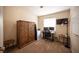 Functional office space with a large cabinet and desk setup for productivity at 5014 Sail Rock Pl, North Las Vegas, NV 89031