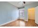 Bedroom with wood flooring, natural light, a closet, and neutral colored walls at 508 Indian Princess Dr # 104, Las Vegas, NV 89145