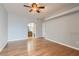 Bright bedroom features wood floors and access to a bathroom at 508 Indian Princess Dr # 104, Las Vegas, NV 89145
