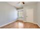 Cozy bedroom with a ceiling fan, natural light from the window, and laminate wood flooring at 508 Indian Princess Dr # 104, Las Vegas, NV 89145