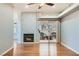 Bright living room features a fireplace, wood floors and a sliding door to an outdoor patio at 508 Indian Princess Dr # 104, Las Vegas, NV 89145
