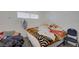 Cozy bedroom featuring a comfortable bed and chair at 5228 Pebble Beach Blvd, Las Vegas, NV 89108