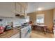 Updated kitchen featuring gas range, eat in kitchen and laminate counters at 5228 Pebble Beach Blvd, Las Vegas, NV 89108