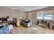 Comfortable living room with bright natural light, and neutral wall color at 5228 Pebble Beach Blvd, Las Vegas, NV 89108