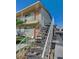 Staircase with metal railings leading to second-story apartment units at 5228 Pebble Beach Blvd, Las Vegas, NV 89108