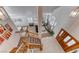 Open foyer features a staircase, tiled floors, and bright lighting, creating a welcoming entrance to the home at 5501 Painted Sunrise Dr, Las Vegas, NV 89149